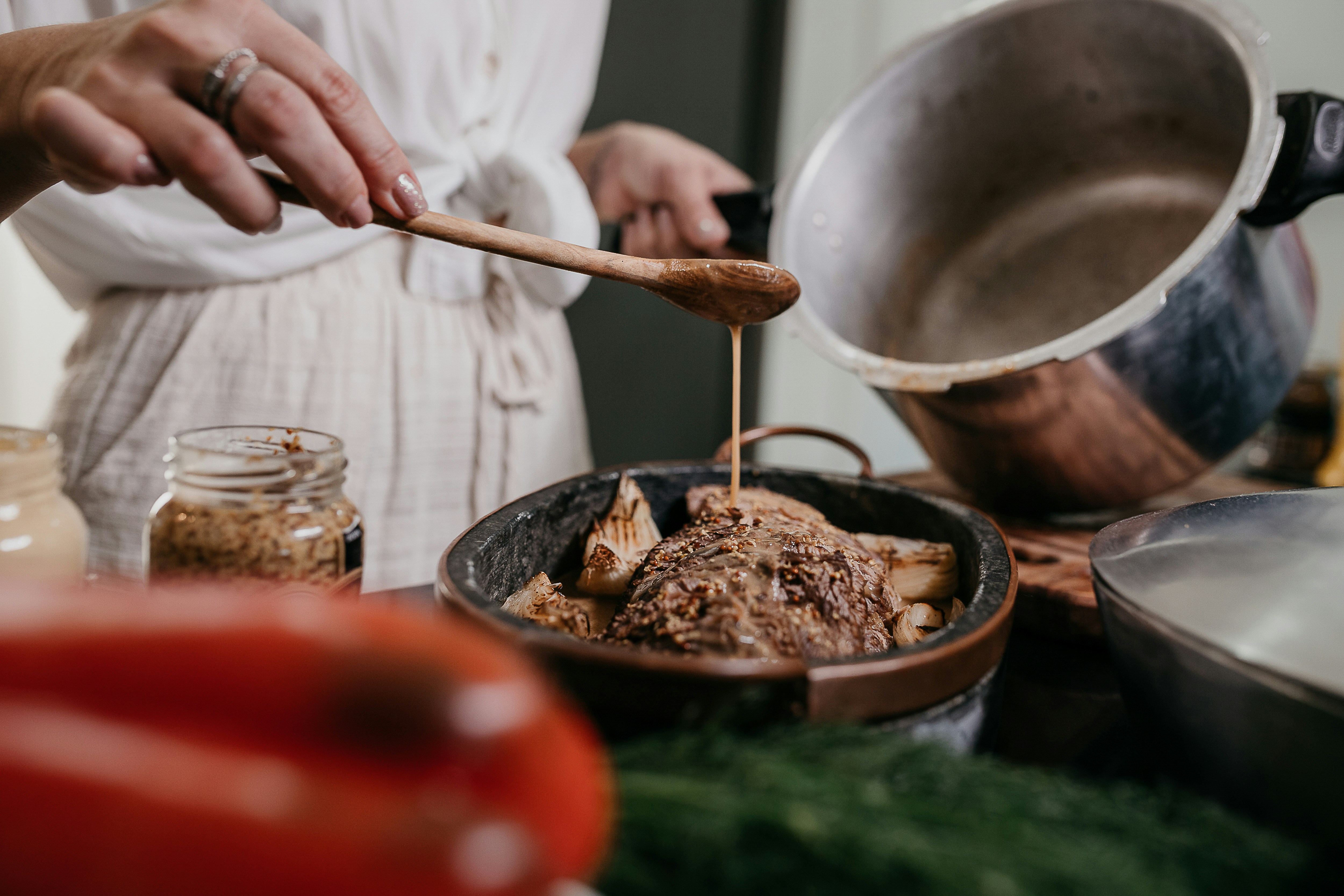 A chef kneading dough in a private kitchen